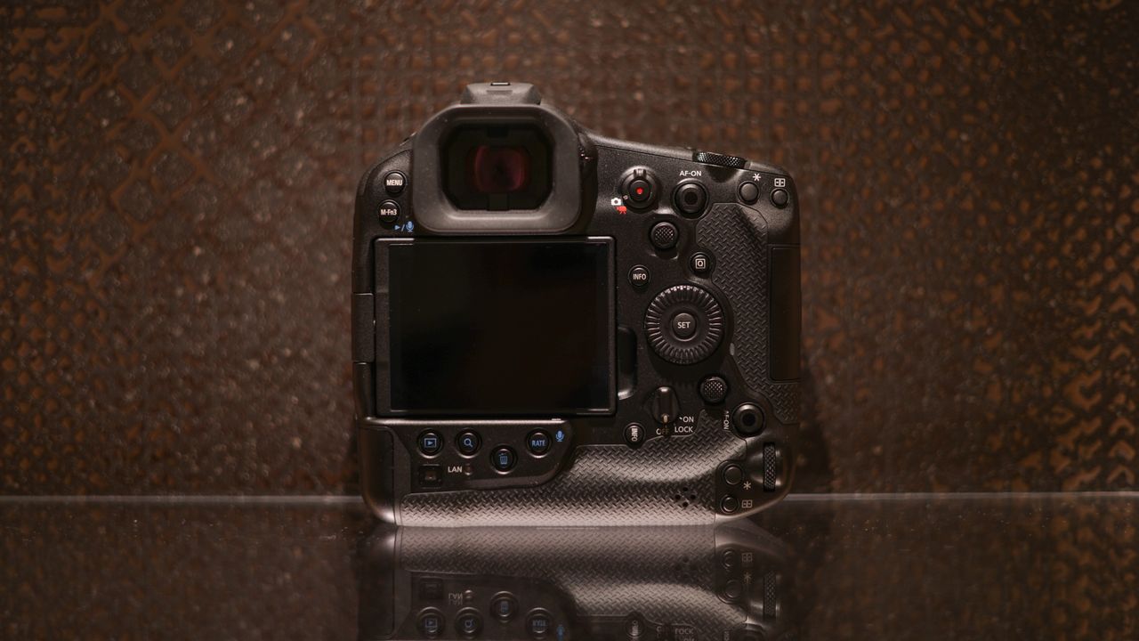 Canon EOS R1 against a dark background