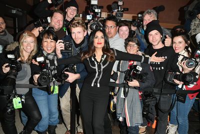 Smile, Product, Social group, Cameras & optics, Youth, Team, Camera, Flash photography, Bag, Video camera,