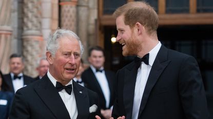 King Charles and Prince Harry in tuxes at a black tie event