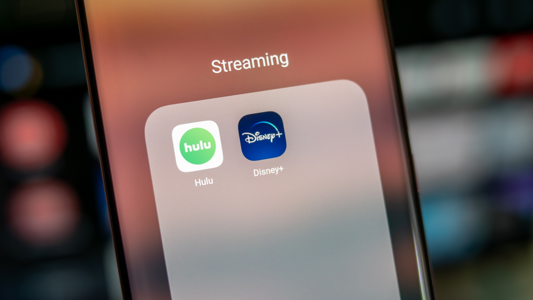 Disney Plus and Hulu icons next to each other on a phone screen