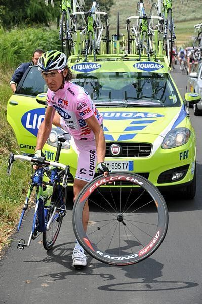 Franco Pellizotti (Liquigas) has front wheel flat.