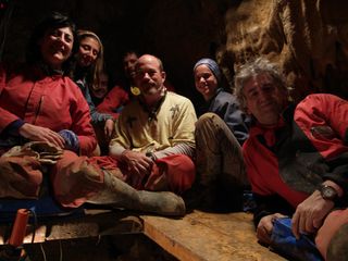 Here, the team of researchers who discovered hominin remains, including several skulls, in the Spanish cave Sima de los Huesos.