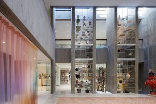 everson museum of art east wing redesign by MILLIONS concrete geometric volumes and colourful soft interiors and planters