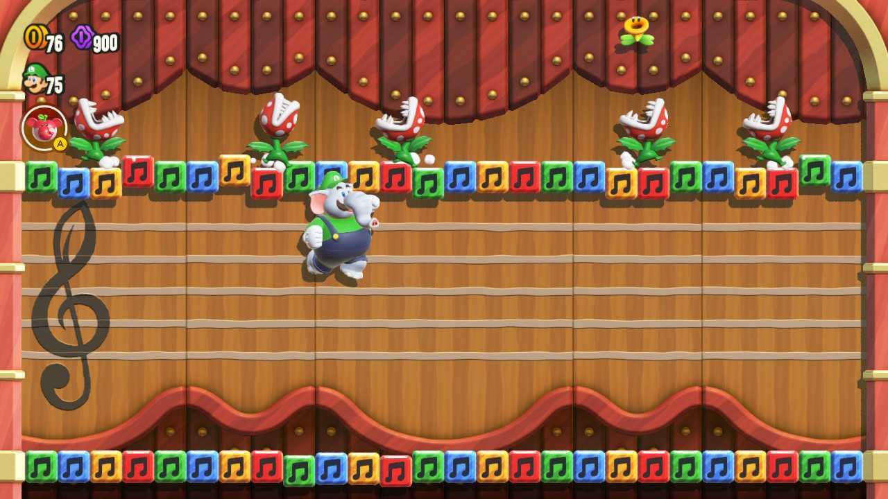 Elephant Luigi seen taking out Piranha Plants in a Break Time! level in Super Mario Bros. Wonder.