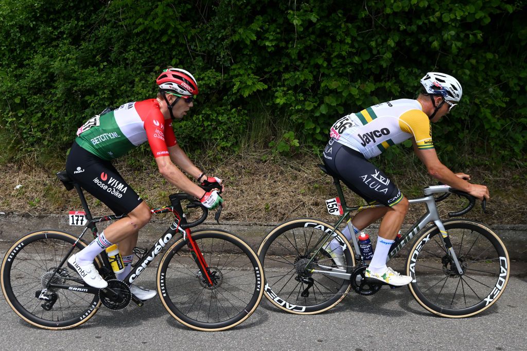 LIVIGNO MOTTOLINO ITALY MAY 19 LR Attila Valter of Hungary and Team Visma Lease a Bike and Luke Plapp of Australia and Team Jayco AlUla compete in the chase group during the 107th Giro dItalia 2024 Stage 15 a 222km stage from Manerba del Garda to Livigno Mottolino 2387m UCIWT on May 19 2024 in Livigno Mottolino Italy Photo by Dario BelingheriGetty Images