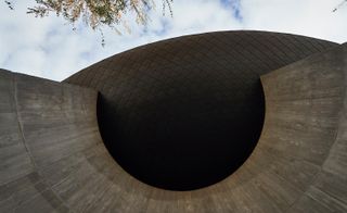 The zinc-clad bowl roof