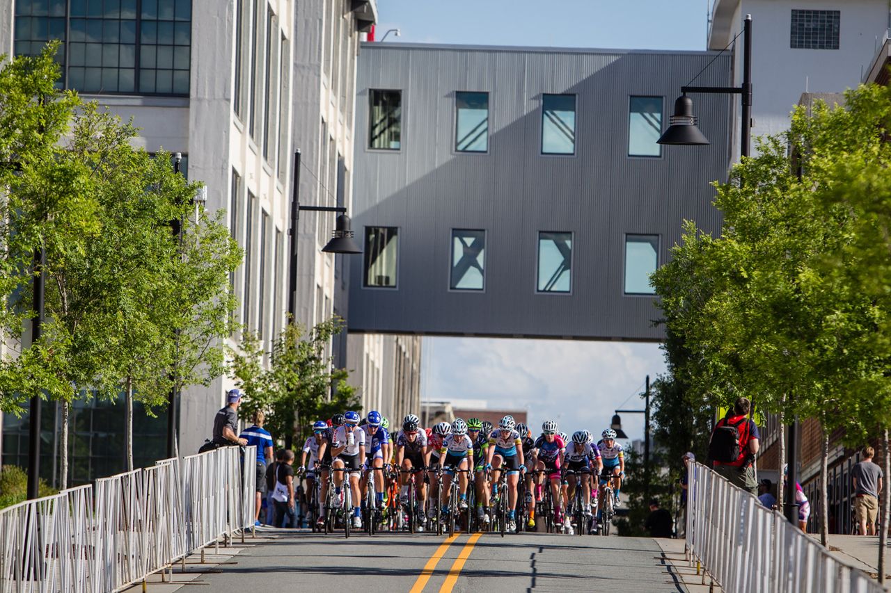 The women bunch up with the break already up the road.