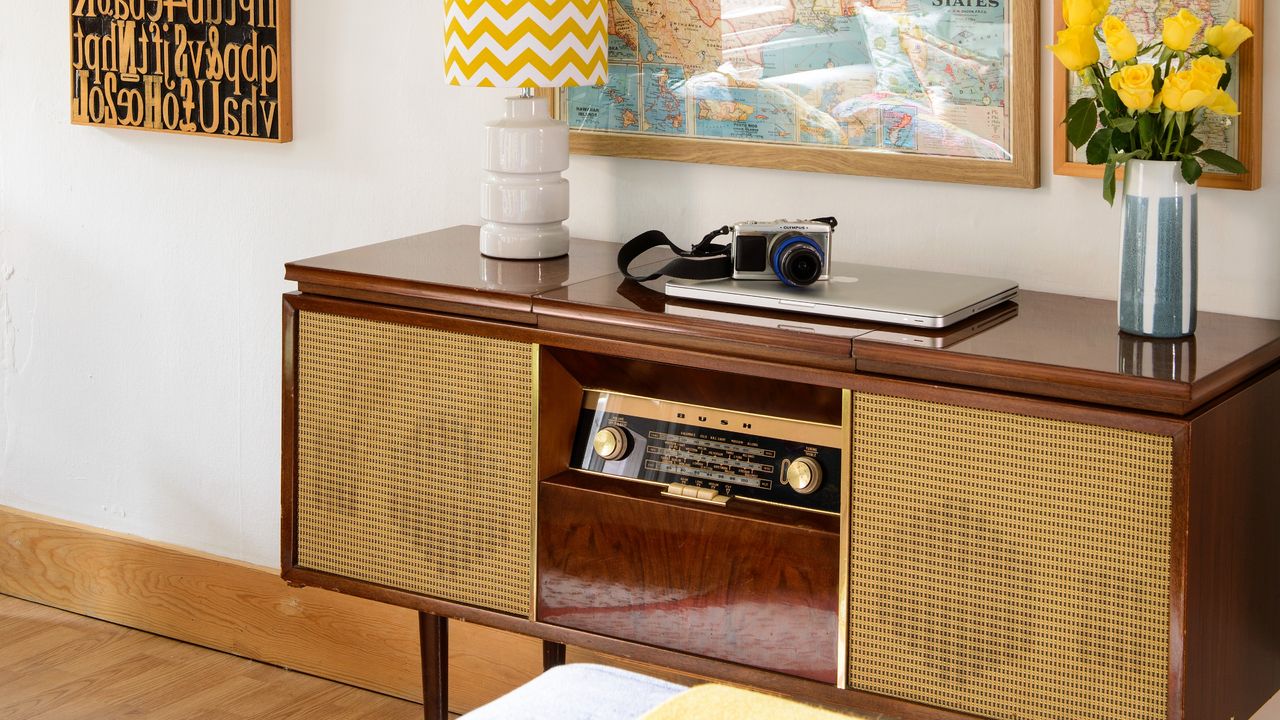 A mid-century modern living room with a TV unit