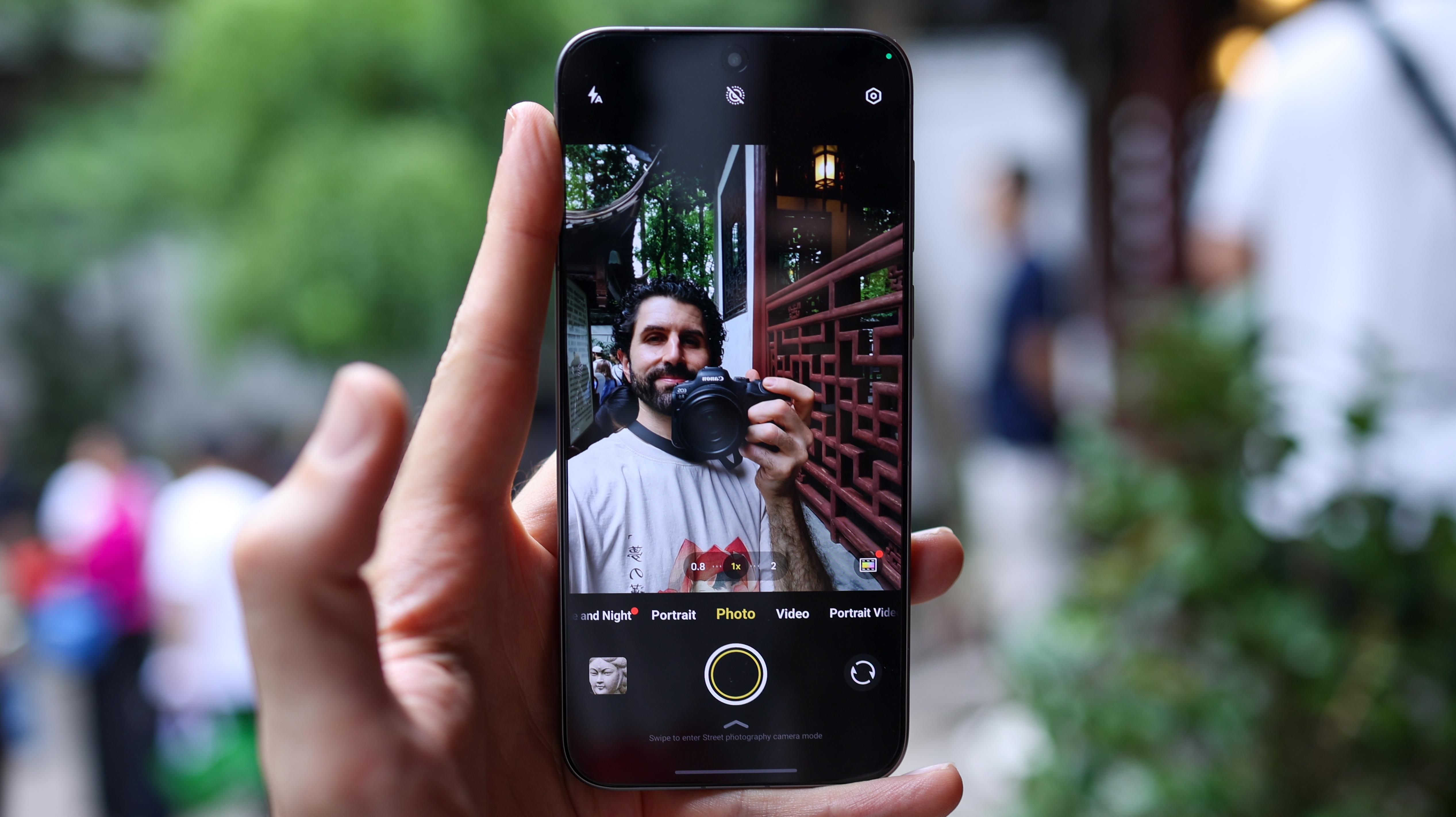 Vivo X300 Pro camera phone held in a hand
