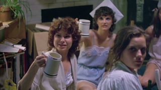 A group of sorority girls hold up cups in 'The House on Sorority Row'