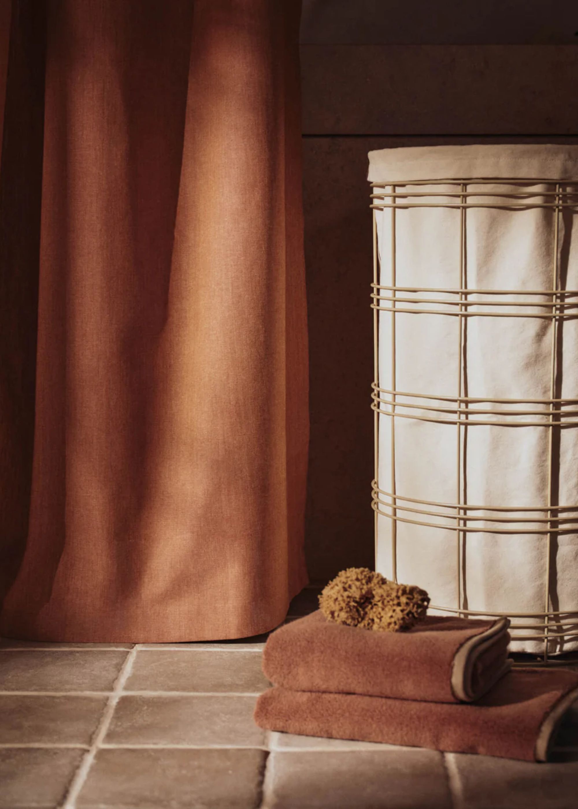 A laundry basket with a wire frame from Ferm Living