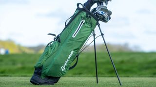 TaylorMade FlexTech SuperLite Golf Stand Bag on the green