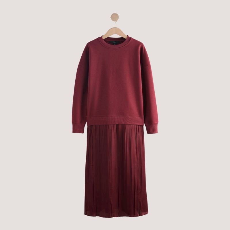 A cutout of a red sweatshirt dress by Next