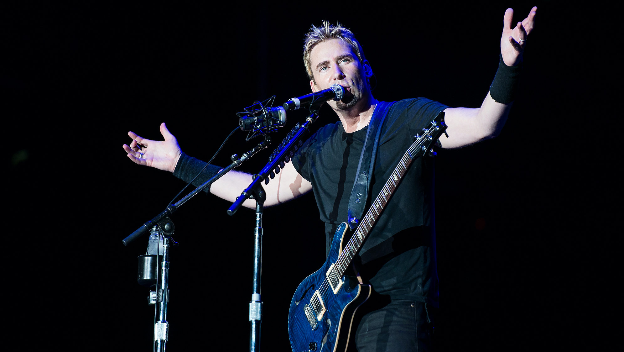 Chad Kroeger of Nickelback performs on stage during a concert in the Rock in Rio Festival on September 20, 2013 in Rio de Janeiro, Brazil