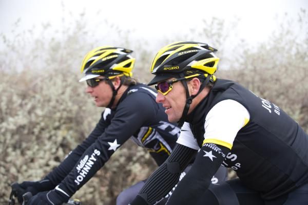 Bart Knaggs and Lance Armstrong on the road.