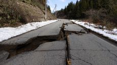 A large crack is seen in a road leading to Wajima, western Japan, on 1 January 2024