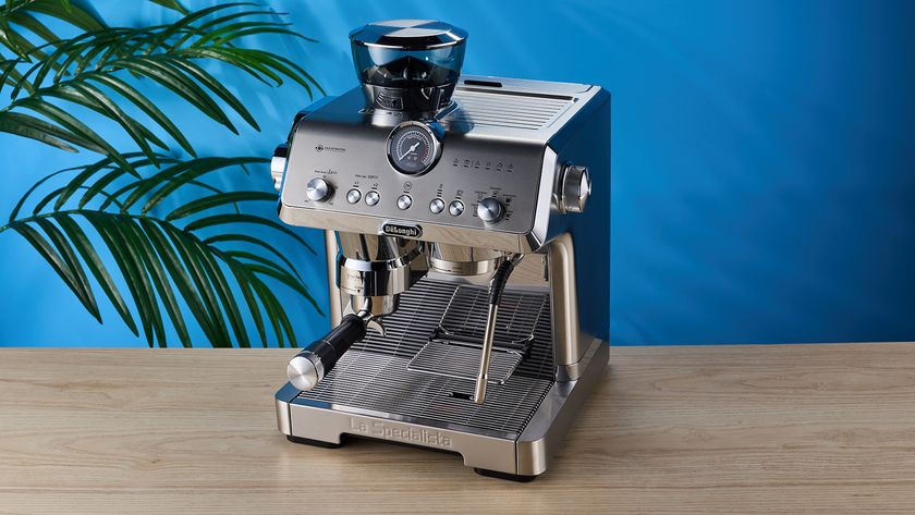 De&#039;Longhi La Specialista Opera is a stainless steel manual espresso machine with smart tamping, a group handle, steam wand, and grinder