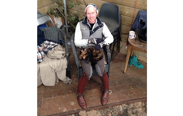 The yard cat helps me out while I teach in the indoor school