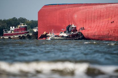 The capsized cargo ship.