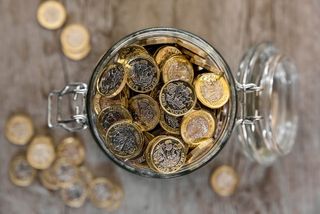 jar of pound coins to represent pensions