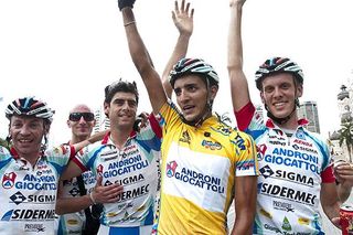Tour winner Jonathan Monsalve celebrates his victory with Androni Giocattoli teammates in KL.