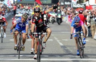 Ans BELGIUM Spains Alejandro Valverde C celebrates on the finish line as he wins the LiegeBastogneLiege cycling race 23 April 2006 in Ans Alejandro Valverde won ahead of Italian second placed Paolo Bettini L and third placed Damiano Cunego R AFP PHOTO BELGA ERIC LALMANDAFP Photo credit should read ERIC LALMANDAFP via Getty Images