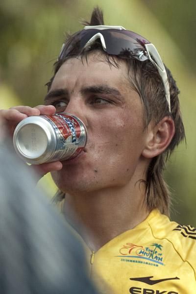 Tour winner Valentin Iglinskiy (Astana) takes a well deserved drink in Sanya after the completion of the tour.