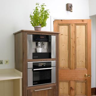 wooden cabinets with coffee maker