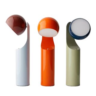 Three table lamps in blue orange and green