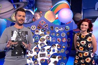Blue Peter presenters Barney Harwood and Lindsey Russell help to announce the mission patch contest on television.
