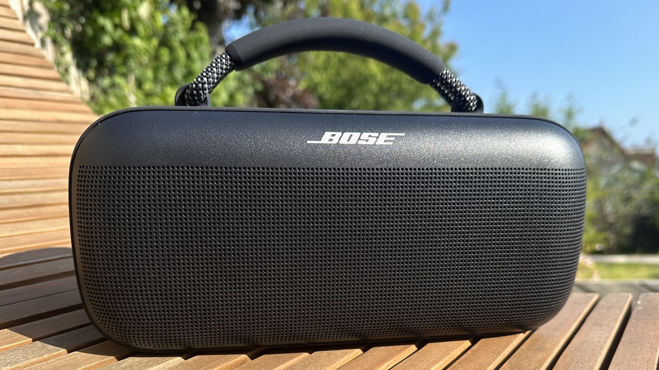 Bose SoundLink Max Bluetooth speaker on wooden table