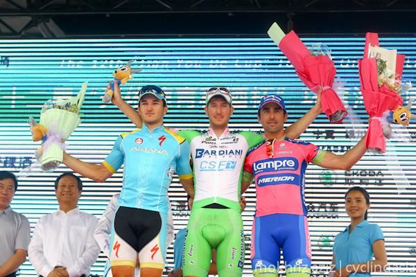 Tour of Qinghai Lake stage 11 podium (L-R): Marco Benfatto, Sacha Modolo and Maximiliano Richeze