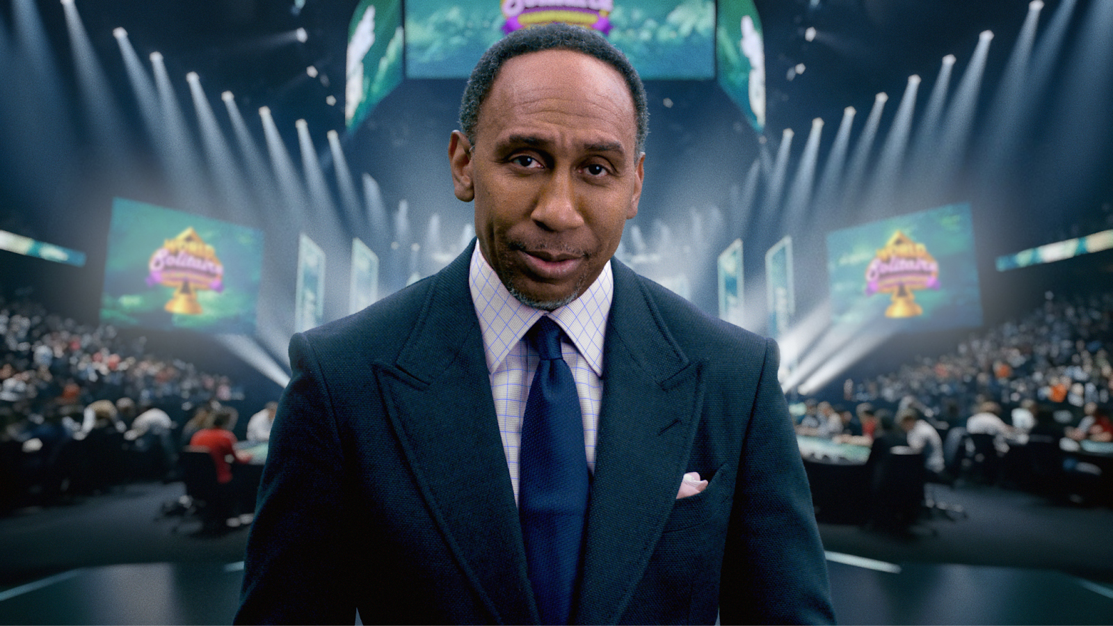 Stephen A Smith in a suit at the Solitaire World Championship