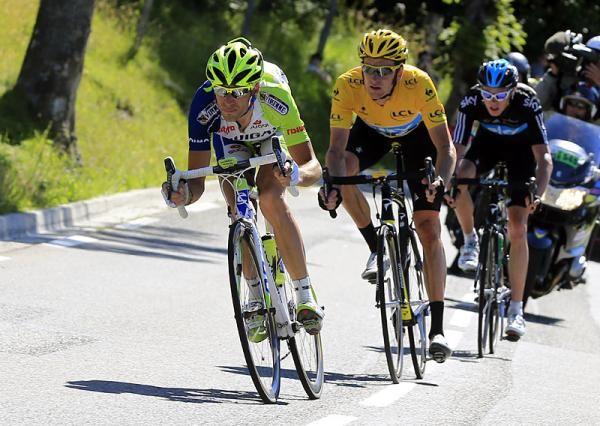 Vincenzo Nibali leads Sky teammates Bradley Wiggins and Chris Froome on the descent to the finish line.