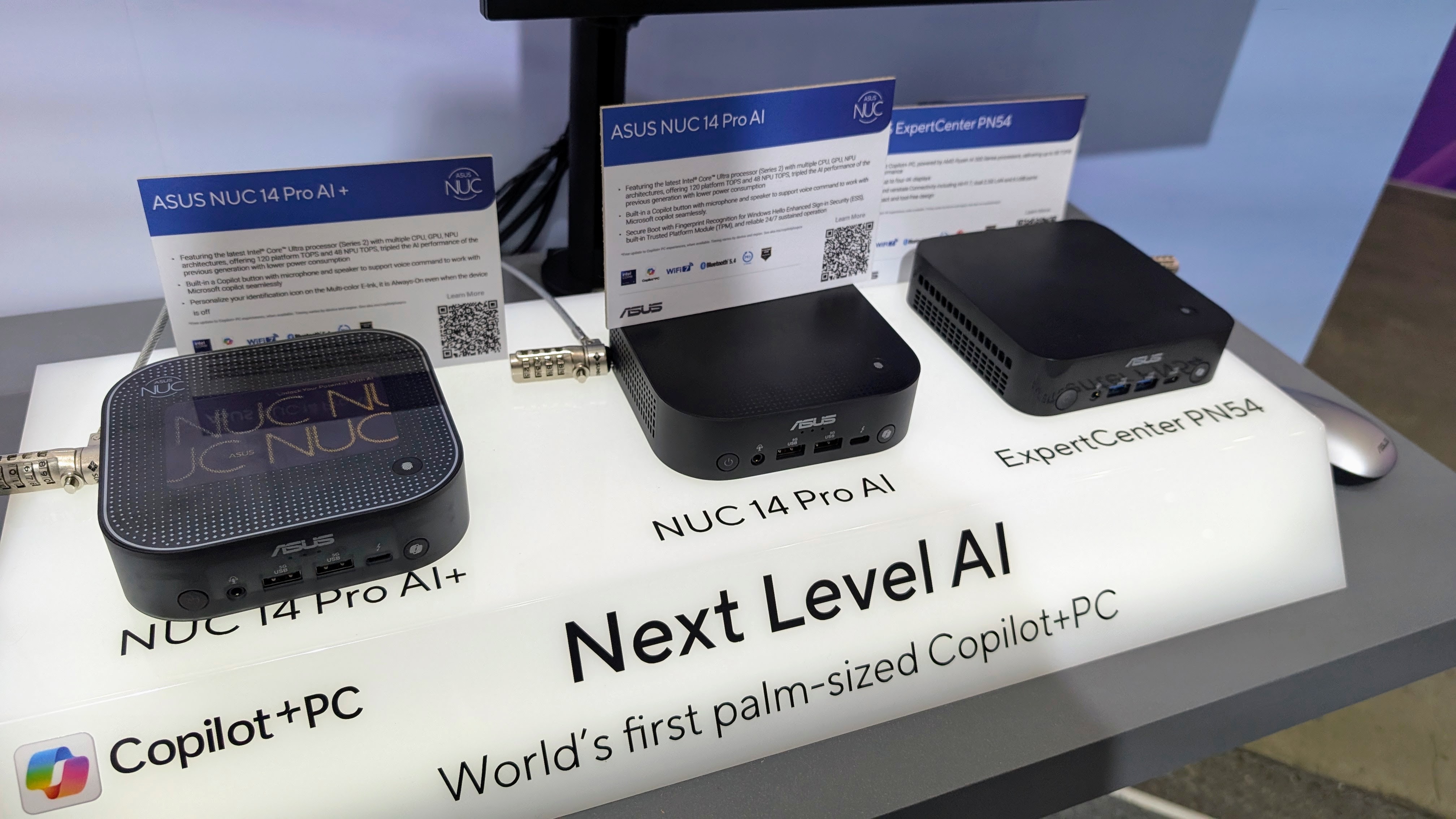 Asus NUCs on display showing NUC 14 Pro AI+, NUC 14 Pro AI and ExpertCenter PN54