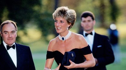 Lord Palumbo greets Princess Diana, wearing a short black cocktail dress designed by Christina Stambolian, as she atttends a Gala at the Serpentine Gallery in Hyde Park on June 29, 1994 in London, England.