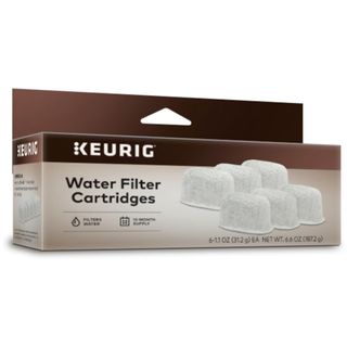 A brown cardboard box of Keurig water filer cartridges