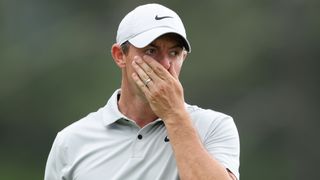 Rory McIlroy reacts after missing a putt on the 18th green in the second round of the 2023 Masters