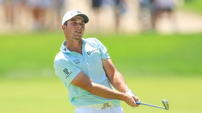 Viktor Hovland of Norway plays his second shot on the first hole during the final round of the 2024 PGA Championship at Valhalla Golf Club on May 19, 2024 in Louisville, Kentucky.