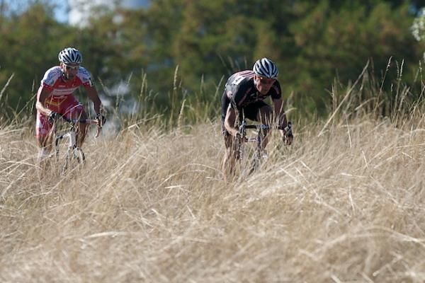 Jonathan Page (Planet Bike) leads Christian Heule through the fields at the Rad Racing Gran Prix.