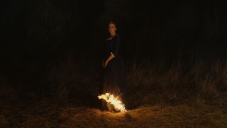 Walking with fire in Portrait Of A Lady On Fire