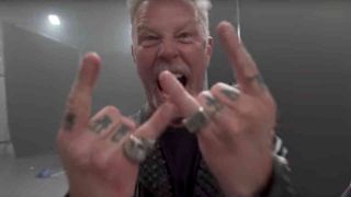 Metallica’s James Hetfield throwing the horns at the camera