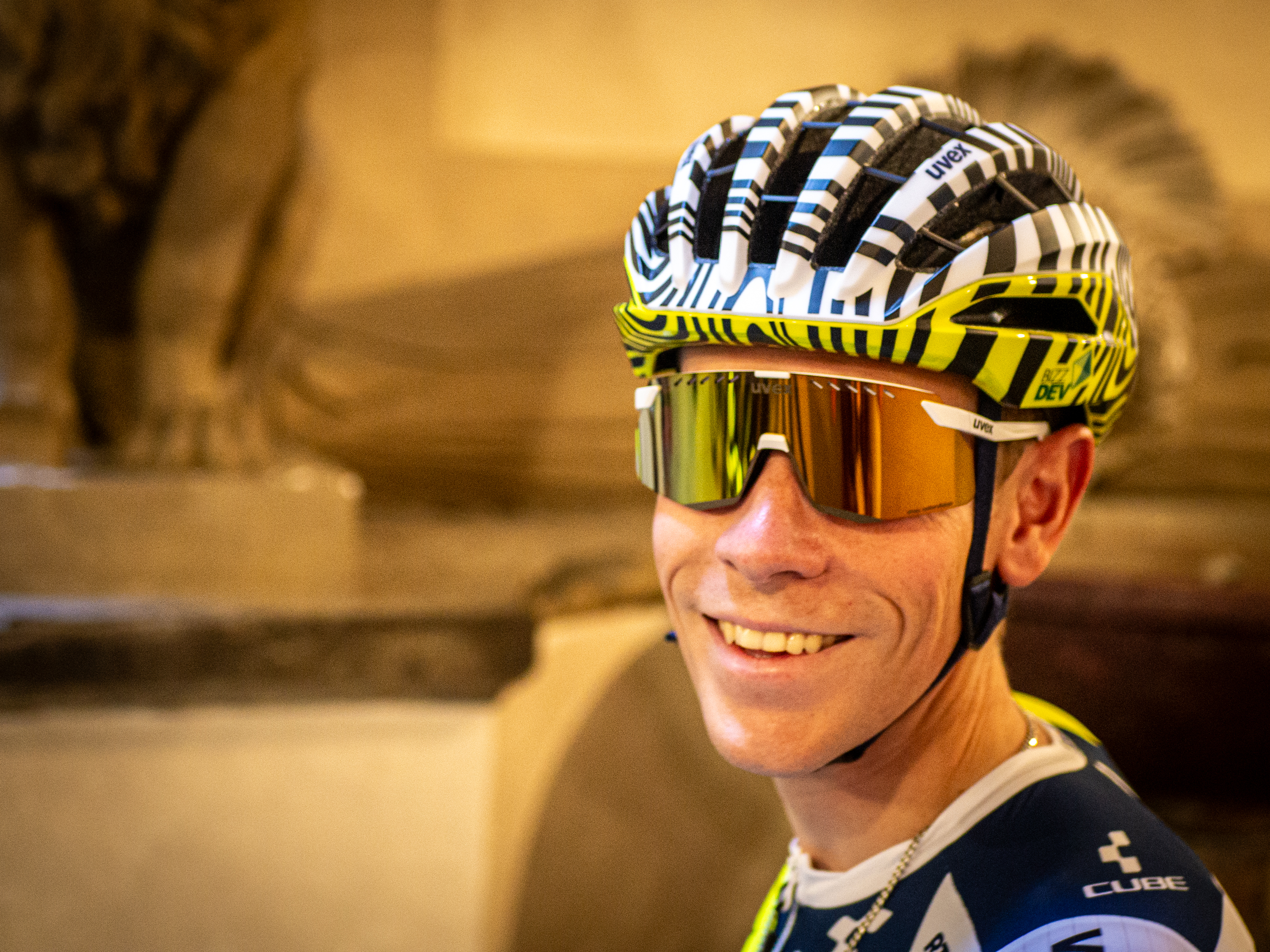 Intermarche Wanty rider poses with a new black and white Uvex helmet
