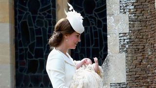 Catherine, Duchess of Cambridge and Princess Charlotte of Cambridge arrive at the Church of St Mary Magdalene on the Sandringham Estate for the Christening of Princess Charlotte of Cambridge on July 5, 2015 in King's Lynn, England
