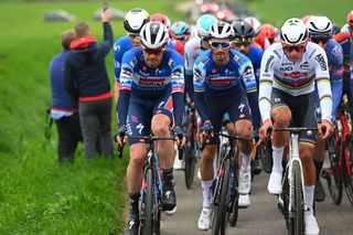 HARELBEKE BELGIUM MARCH 22 LR Kasper Asgreen of Denmark Julian Alaphilippe of France and Team Soudal QuickStep and Mathieu van der Poel of The Netherlands and Team Alpecin Deceuninck compete during the 67th E3 Saxo Bank Classic Harelbeke 2024 a 2076km one day race from Harelbeke to Harelbeke UCIWT on March 22 2024 in Harelbeke Belgium Photo by Tim de WaeleGetty Images