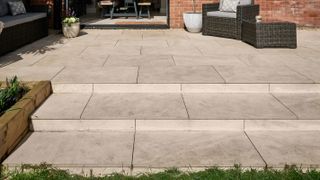 shallow garden steps leading to raised patio