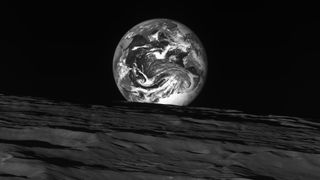 A satellite image of the Earth seen from the moon, taken by South Korea's Danuri spacecraft
