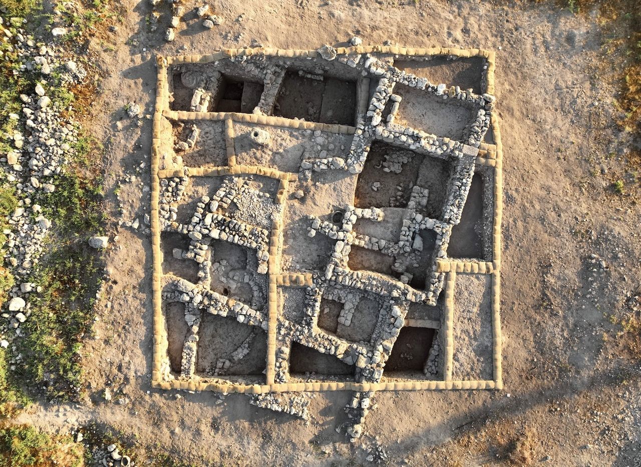 an aerial view of an excavated building