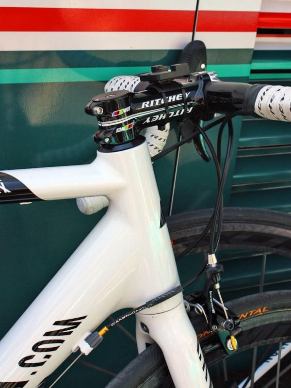 Head tubes on the Omega Pharma-Lotto team bikes are fairly long so most riders opt for a conventional headset cap assembly and slam their stems all the way down.