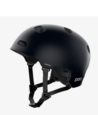 A POC helmet stands against a white background